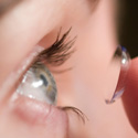 Person inserting Contact Lens